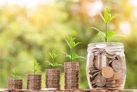 Coins with green plants on them