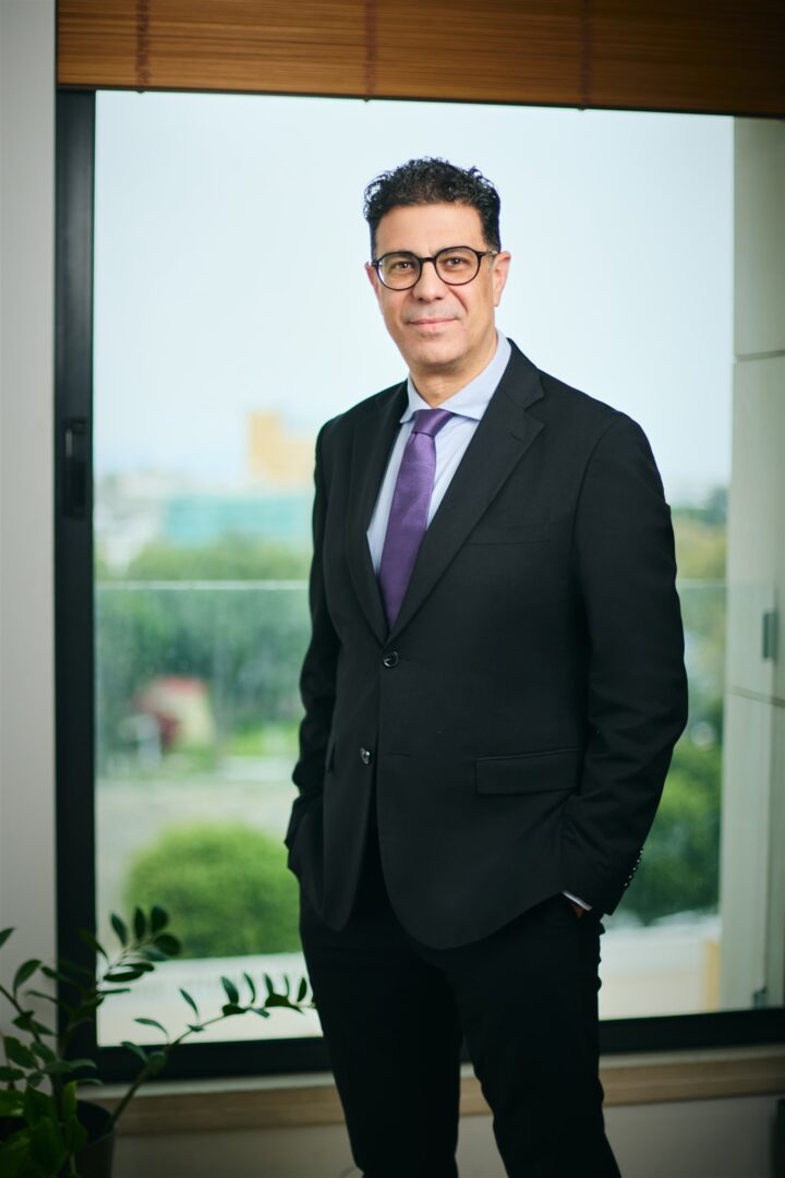 Andreas Mouzourides, Member of the Board of Directors of Invest Cyprus, in an official portrait photograph, April 2026.