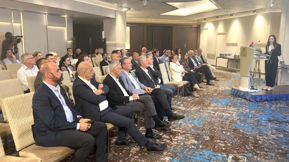 Dr. Chryso Aristeidou of the Central Bank of Cyprus presenting Ship Management Survey results at the Cyprus Shipping Chamber Members Meeting, Limassol, 22 April 2026, confirming record shipmanagement revenues and a 5.4% GDP contribution.